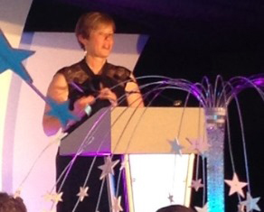 Kate Austin collects Brethertons' Pride of Rugby Award